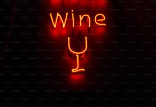 a neon sign that says wine on it
