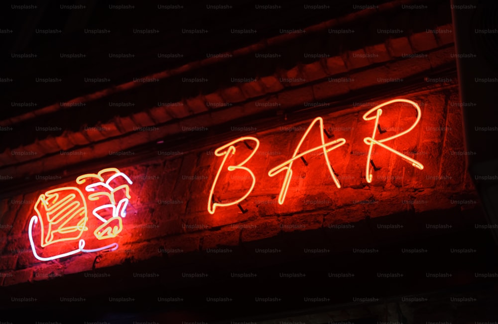 a neon sign on the side of a building