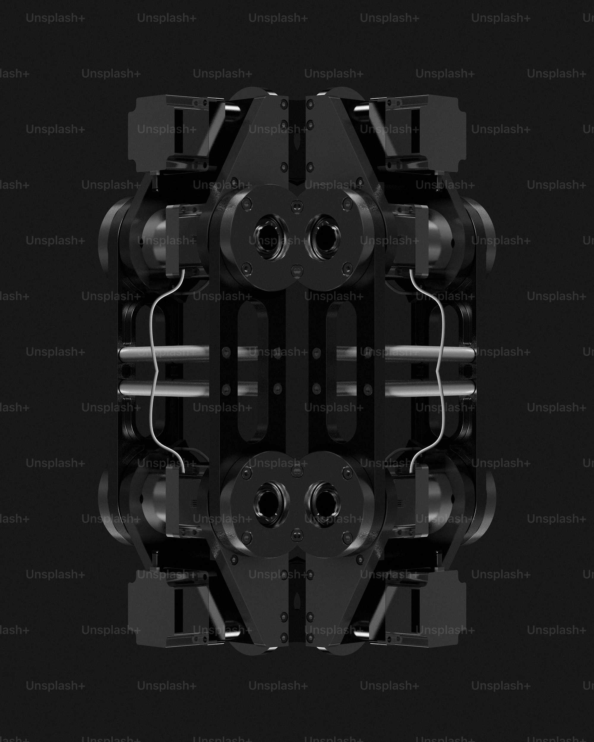 a close up of a black object with a black background