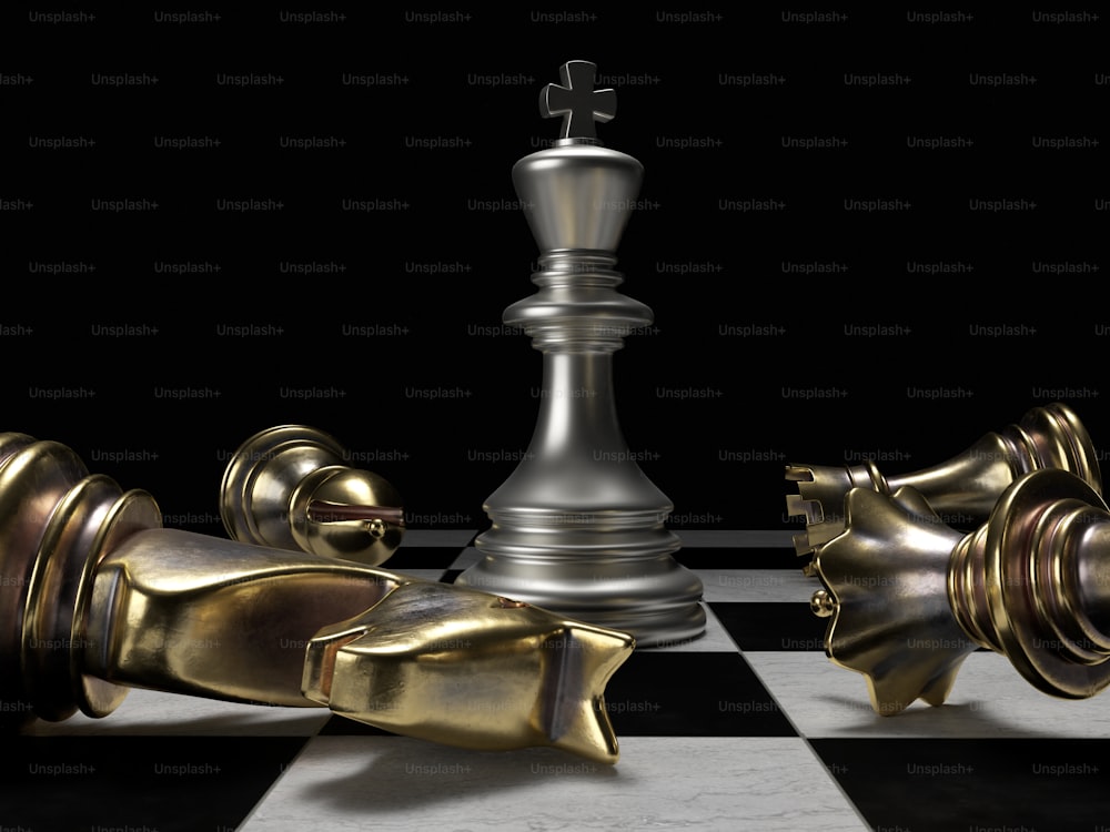 a silver and gold chess set on a black and white checkered floor
