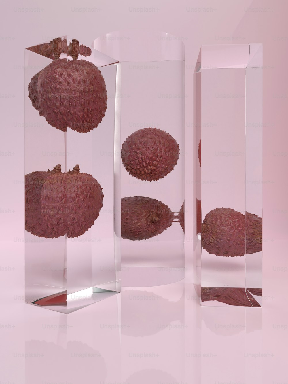 a glass vase filled with fruit on top of a table