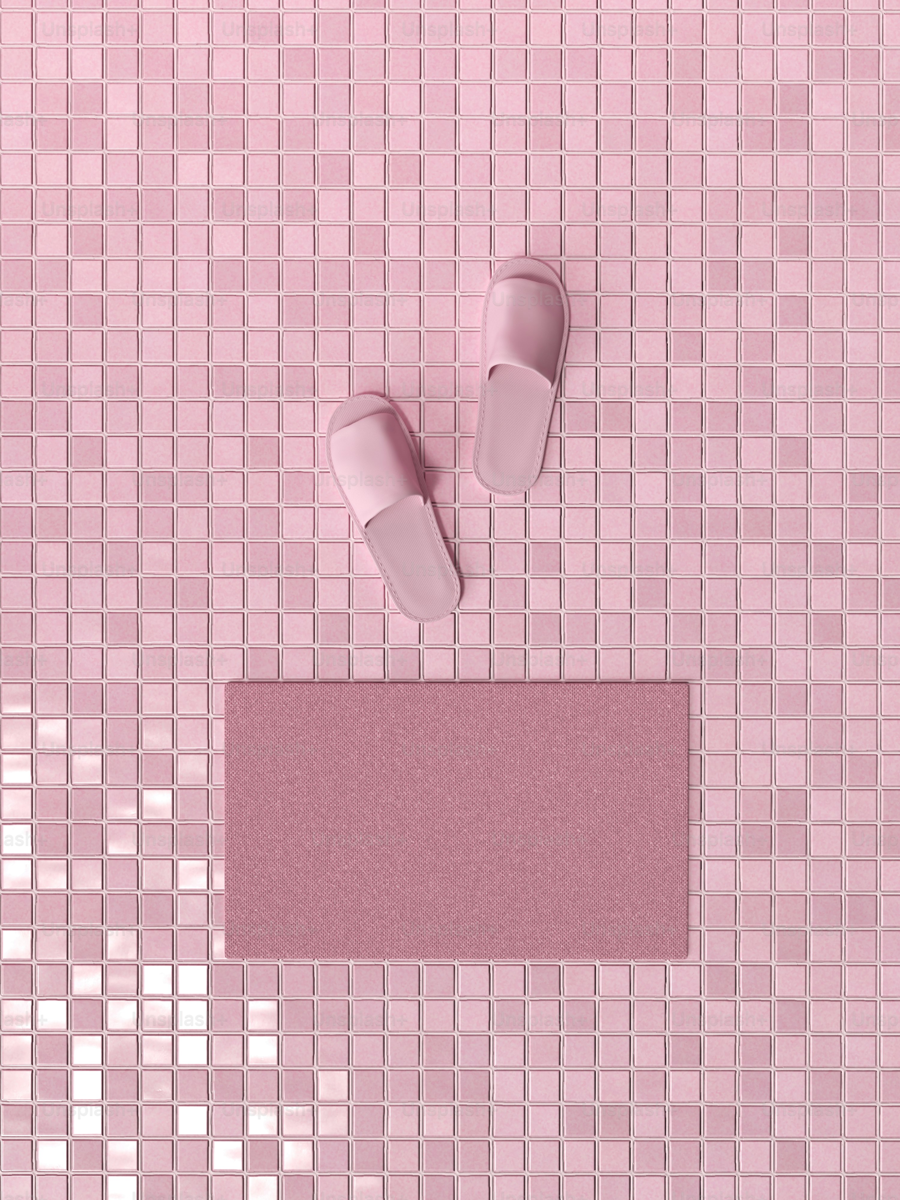 une paire de chaussures de ballet roses sur un sol carrelé rose