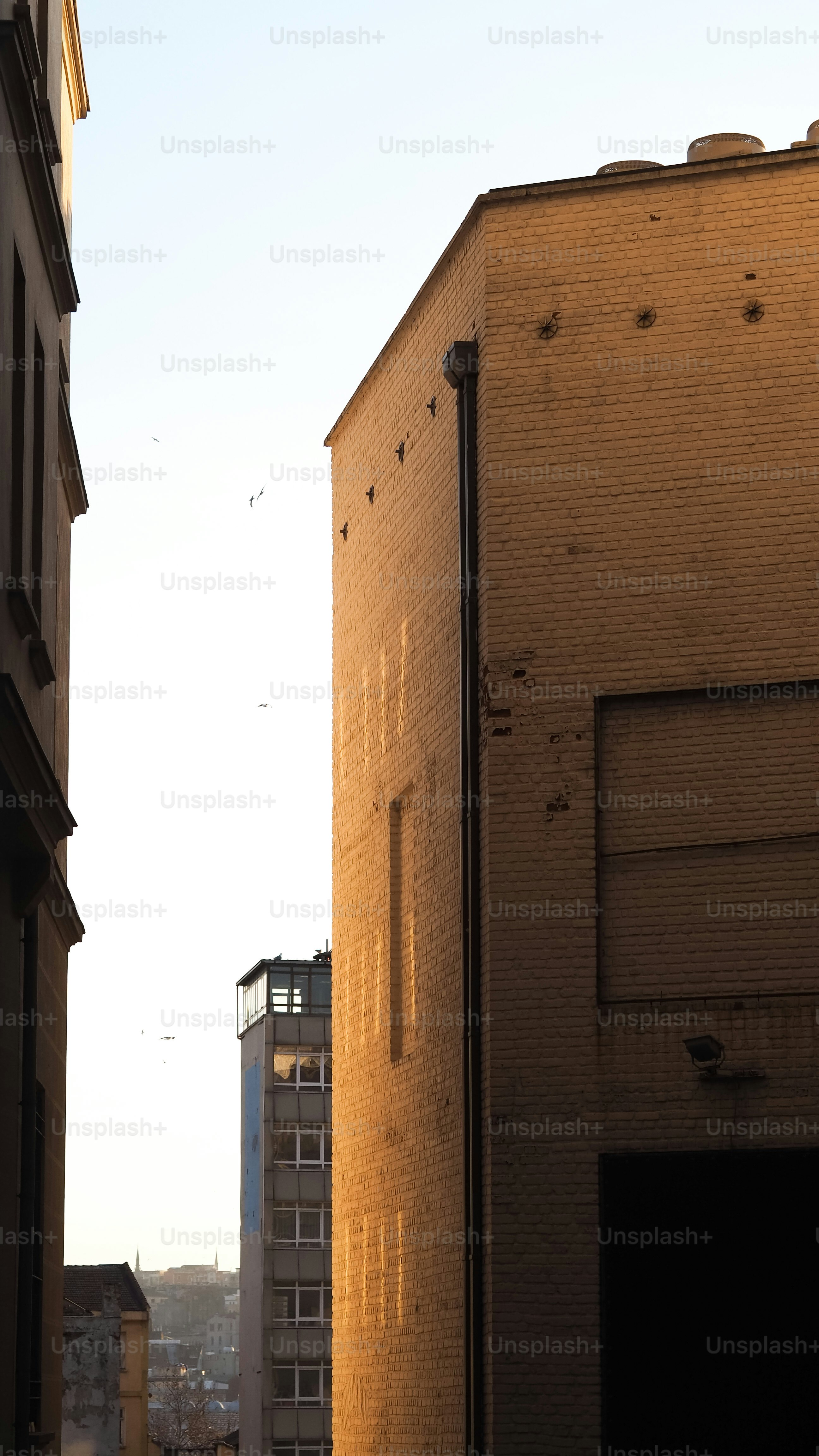 A view of a building from a distance photo – City wall Image on Unsplash