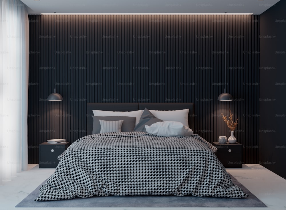 a black and white bedroom with a checkered bedspread