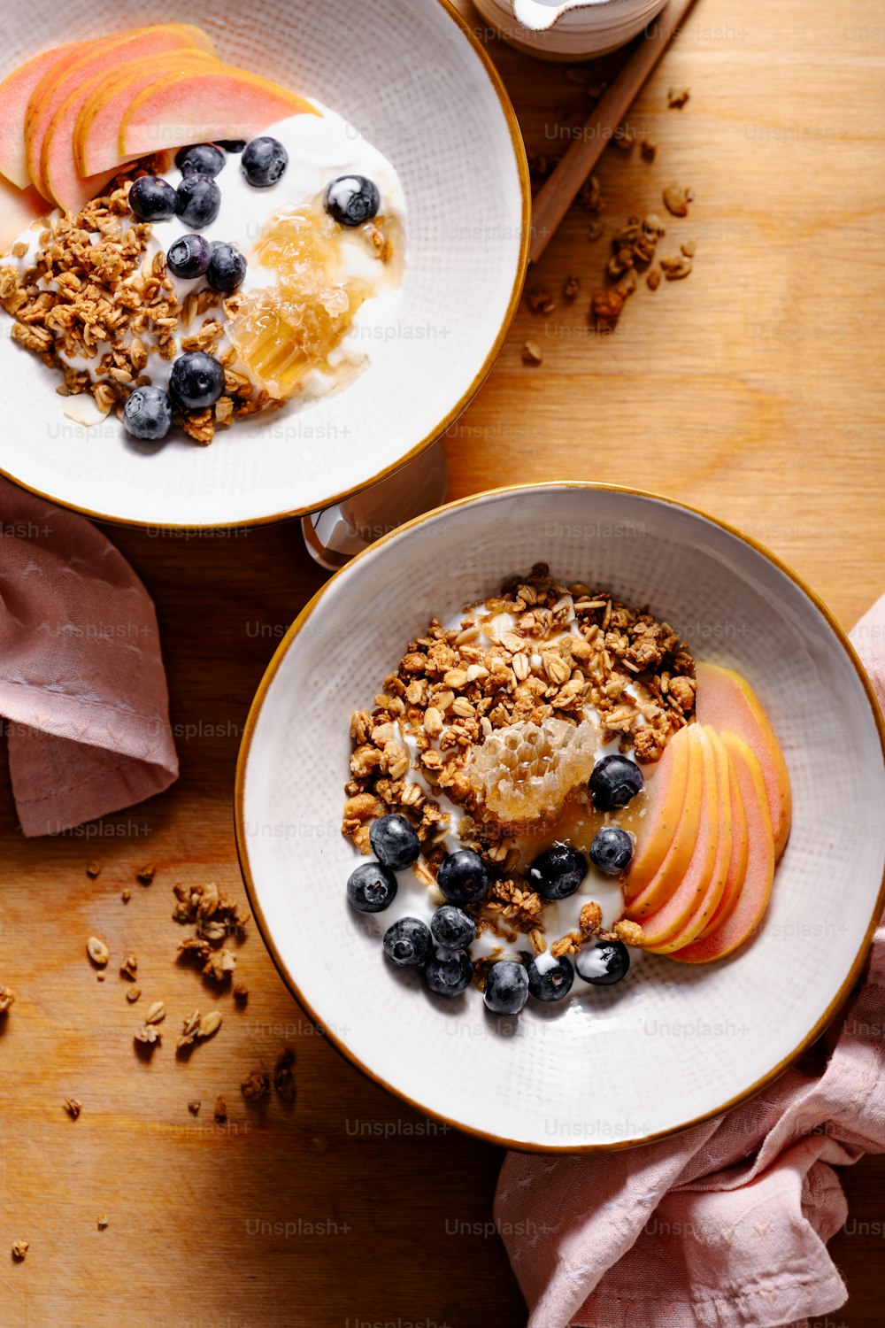 a couple of bowls of food on a table