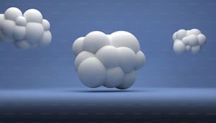 un groupe de boules blanches flottant dans les airs