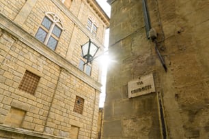 a street sign on the side of a building