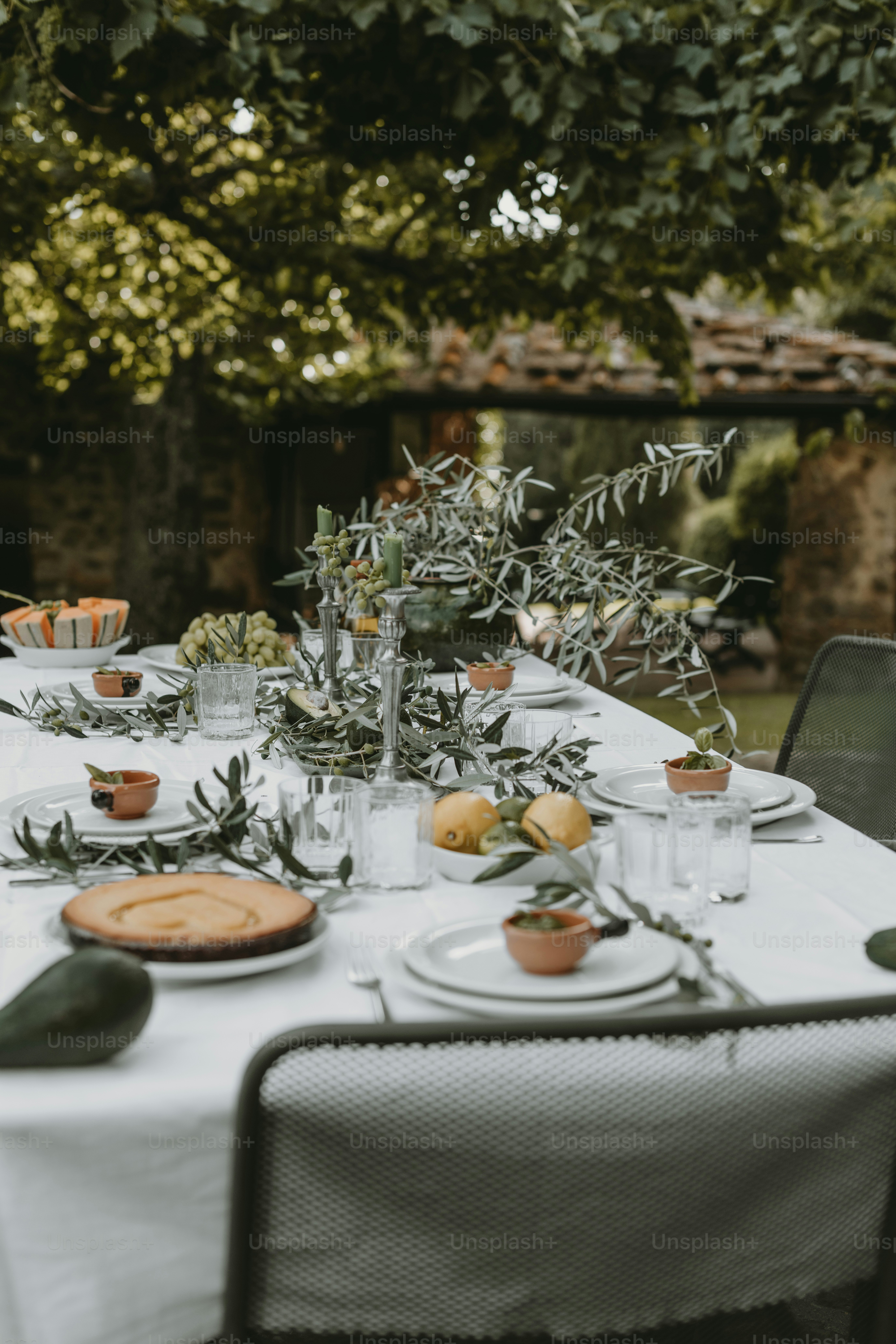 a table with a white table cloth and a white table cloth with a white table
