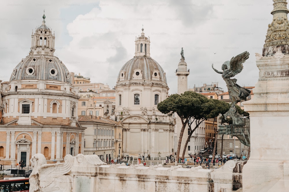 a statue in front of a large building