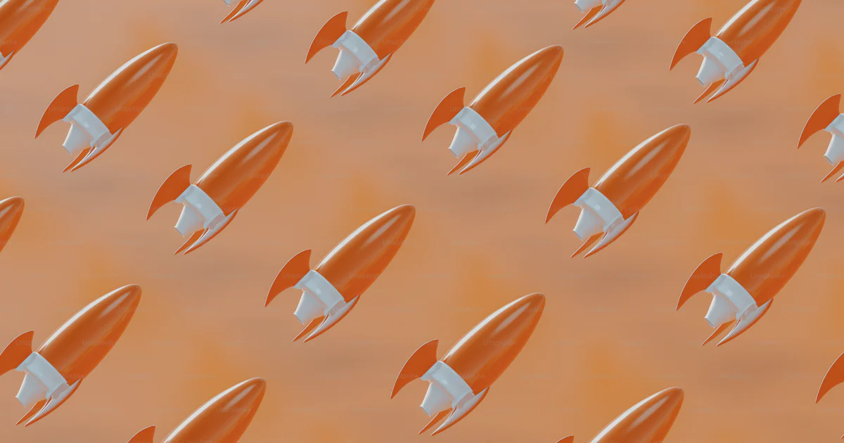 Future Rockets Orange A group of orange and white rockets flying through the air photo ...