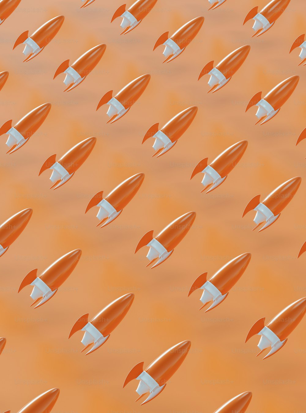 Eine Gruppe orangefarbener und weißer Raketen fliegt durch die Luft