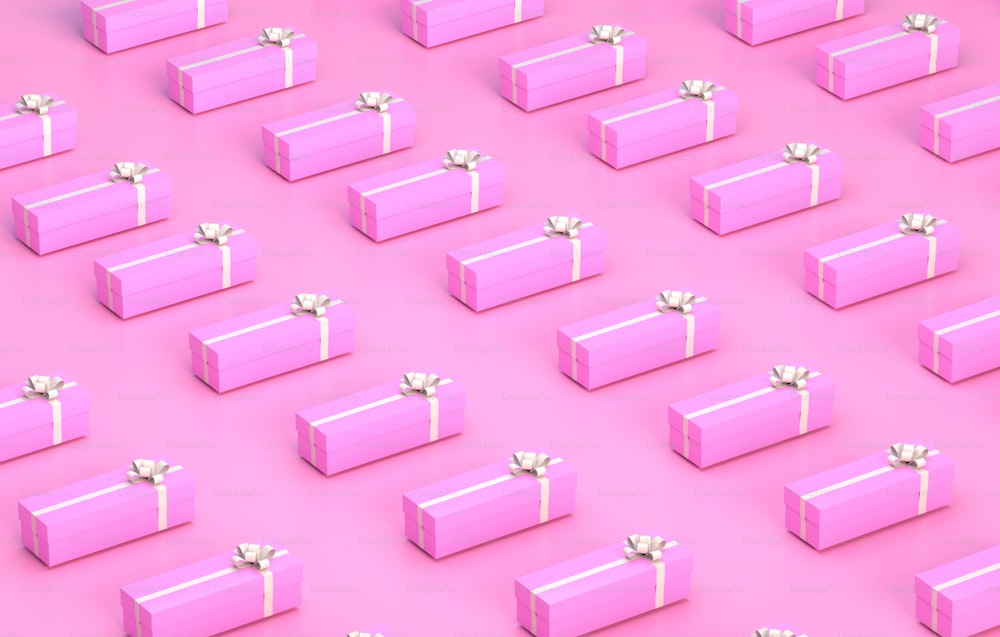 a group of pink boxes with bows on them