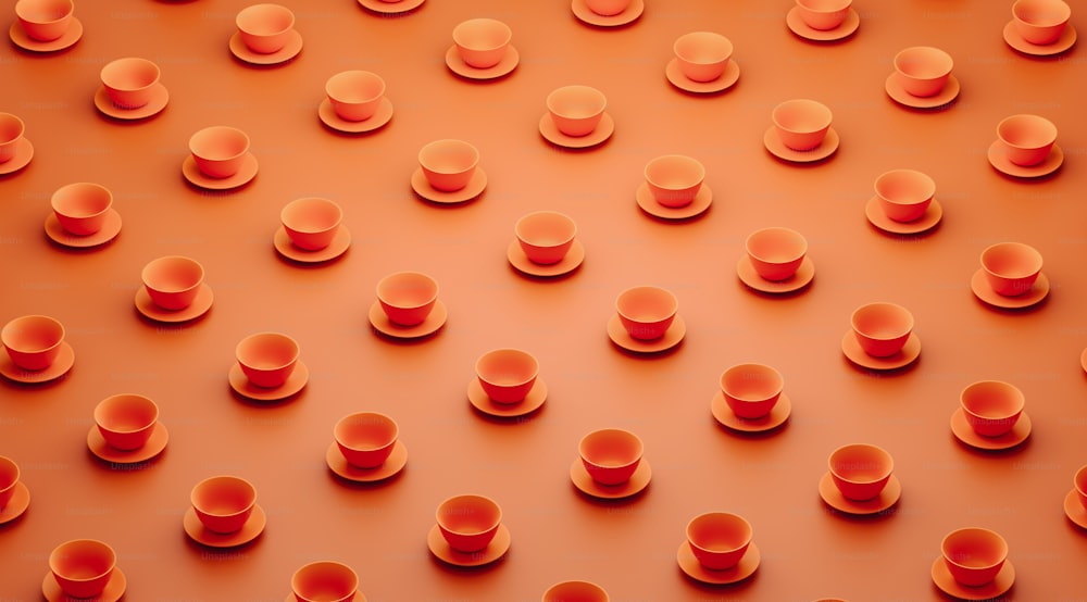 a group of orange cups sitting on top of a table