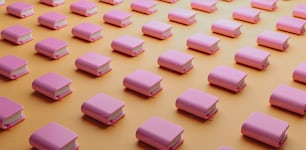 a group of pink objects sitting on top of a yellow surface