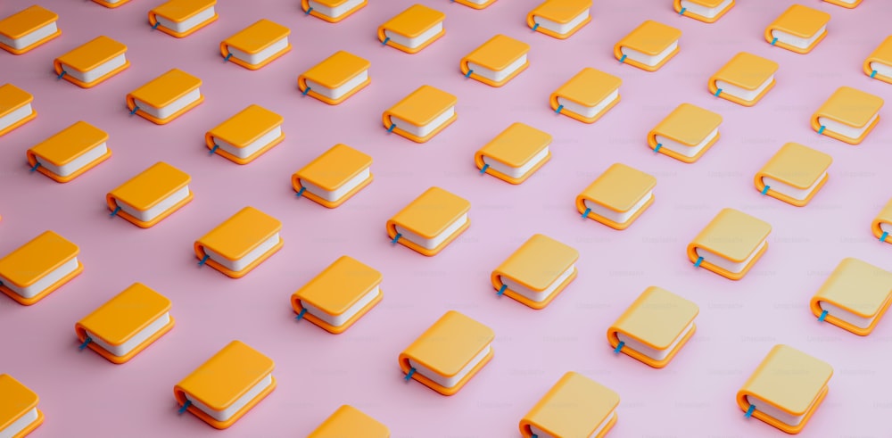 um grupo de objetos quadrados laranja e branco em uma superfície rosa