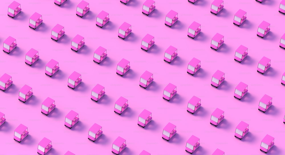 a large group of small pink buildings on a pink background