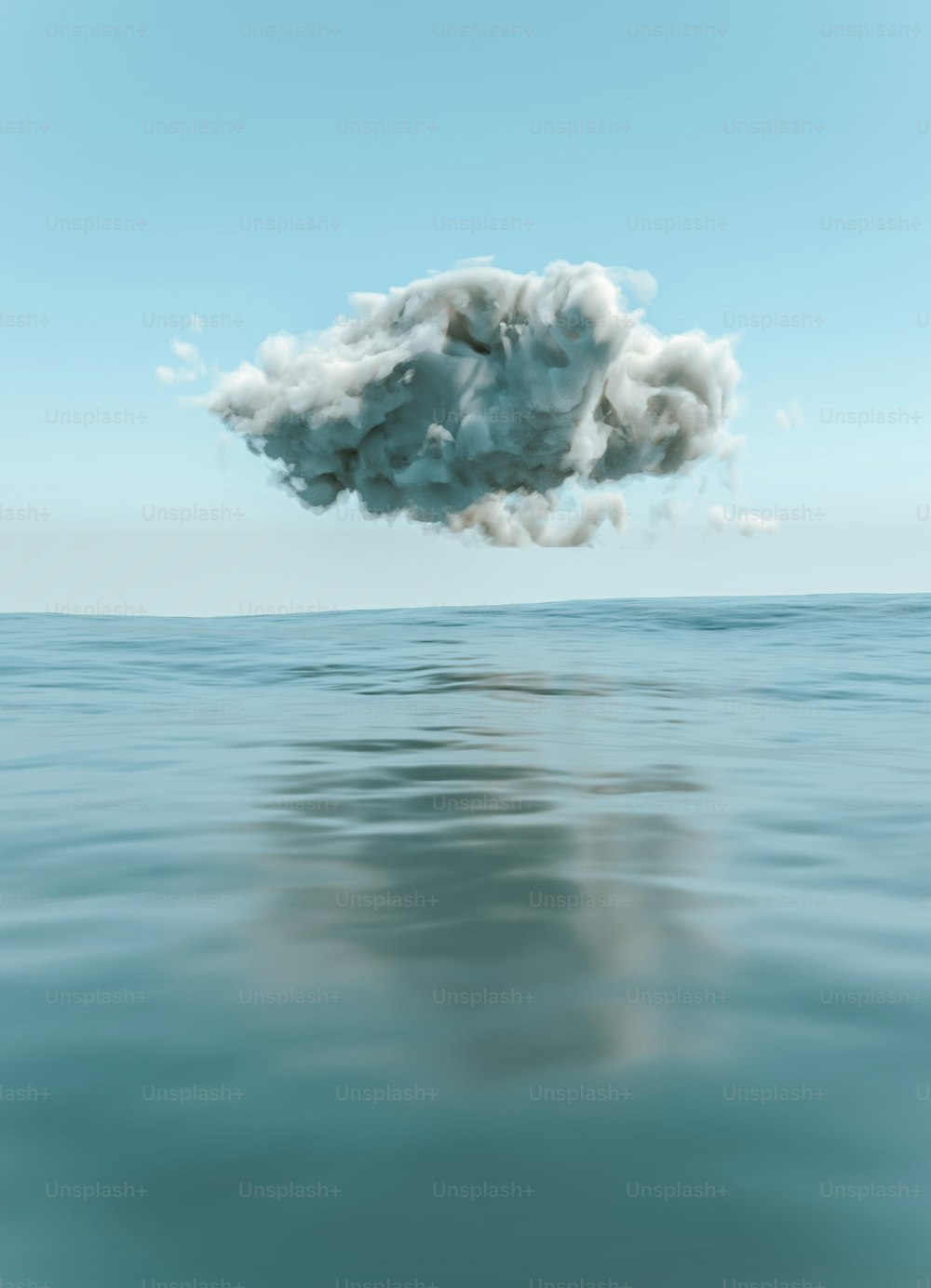 Una nuvola che fluttua nell'aria sopra uno specchio d'acqua