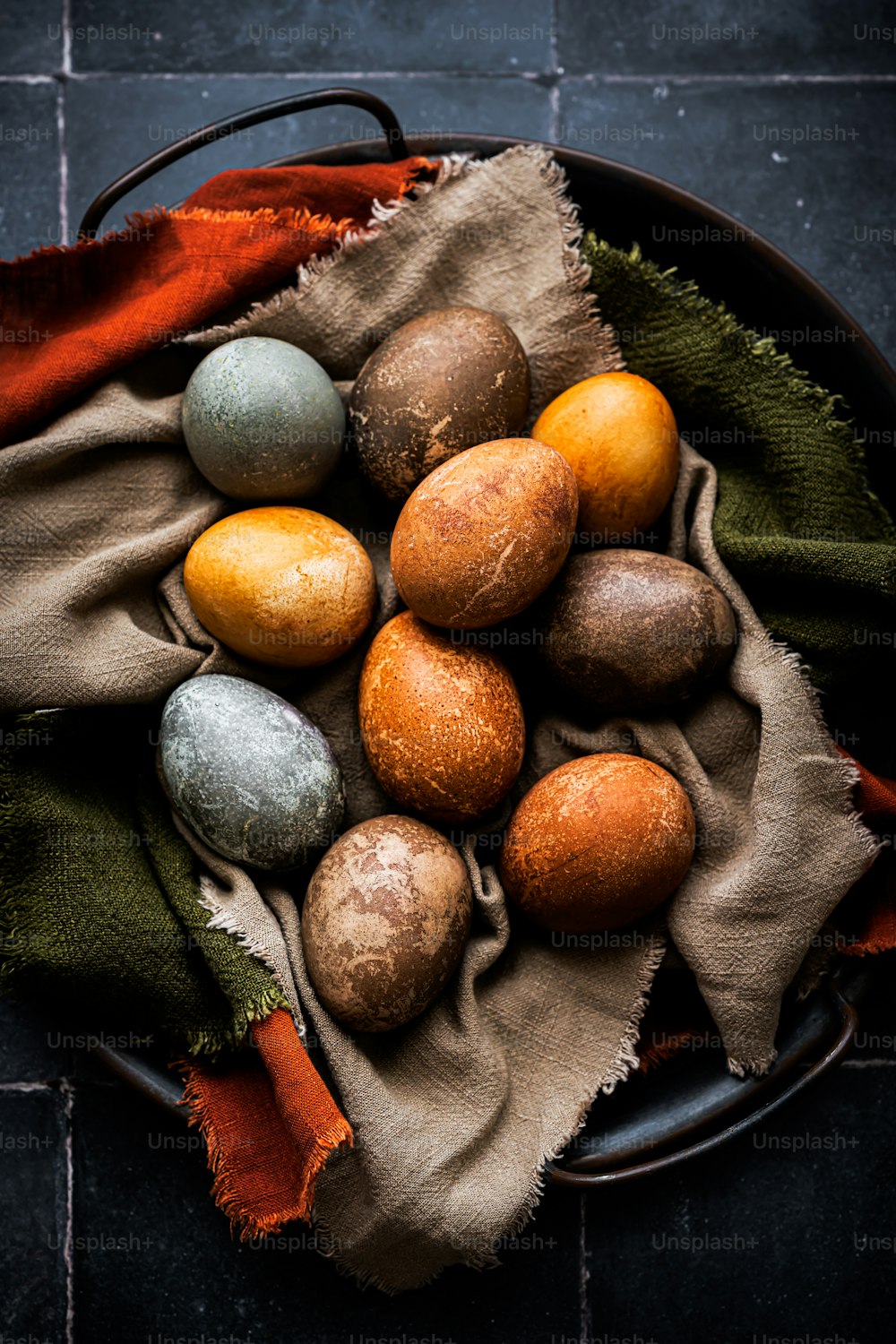 a plate of eggs on a cloth on a table