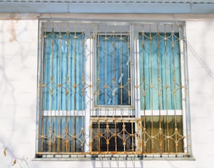 a window with bars and bars on it