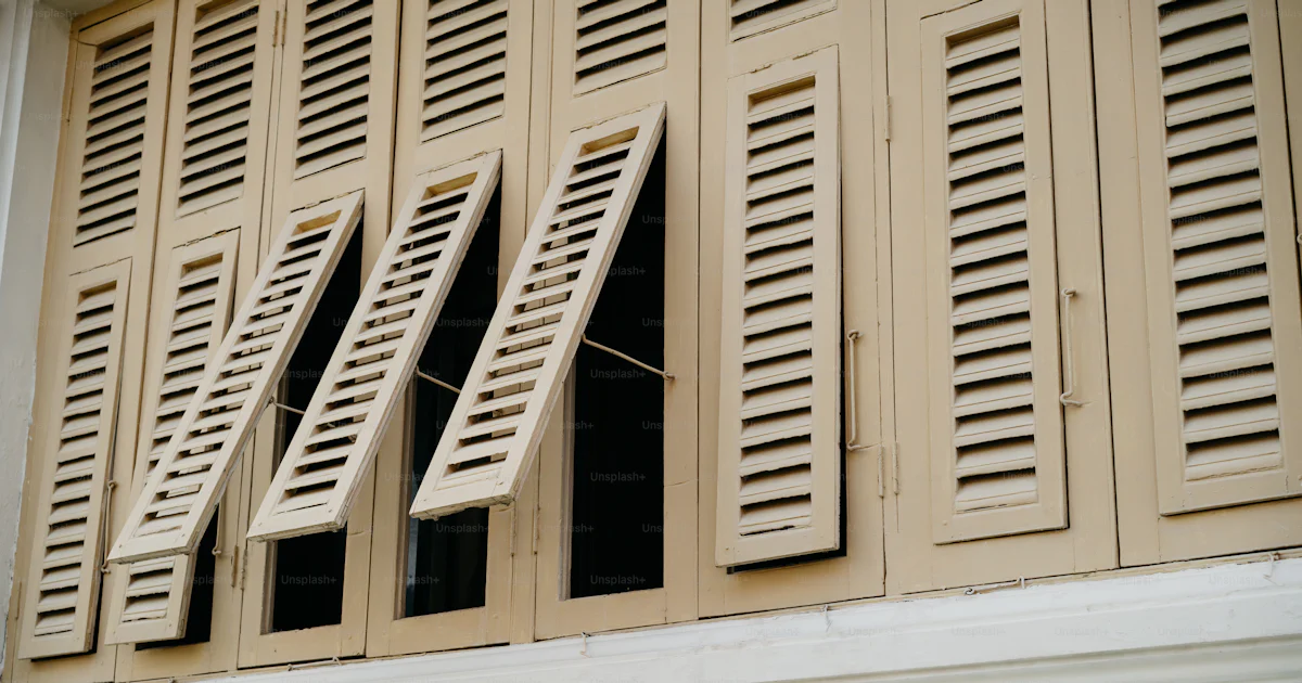 A close up of a window with closed shutters photo – Windows Image on ...