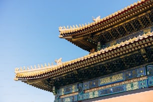 a tall building with a sky in the background