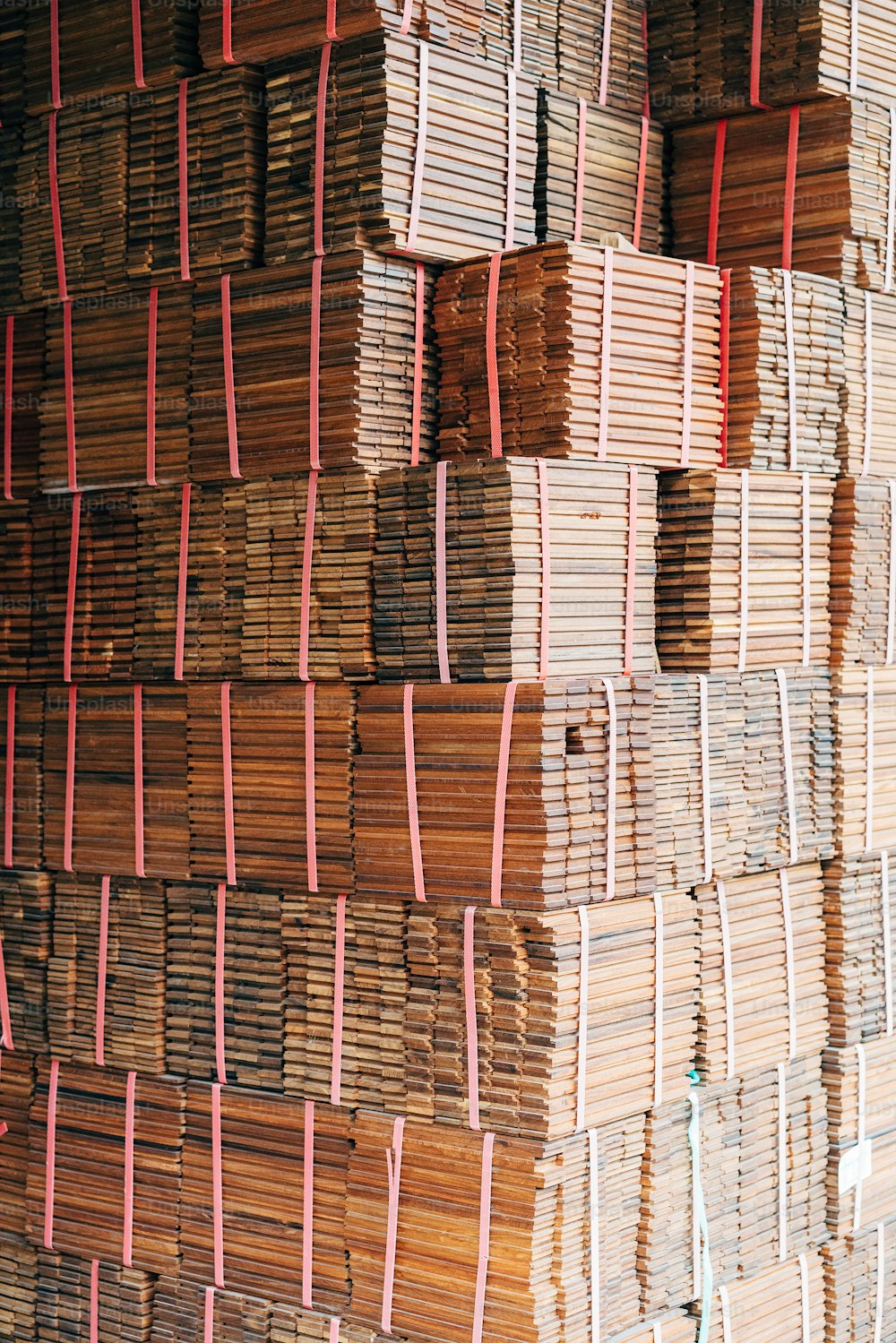 stacks of wooden boards stacked on top of each other