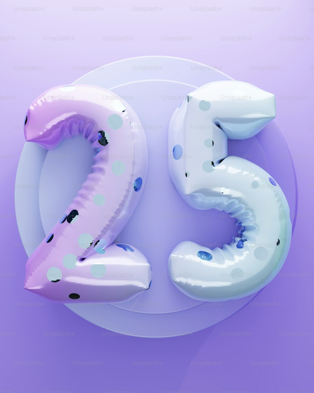 a pink and white balloon shaped like a number