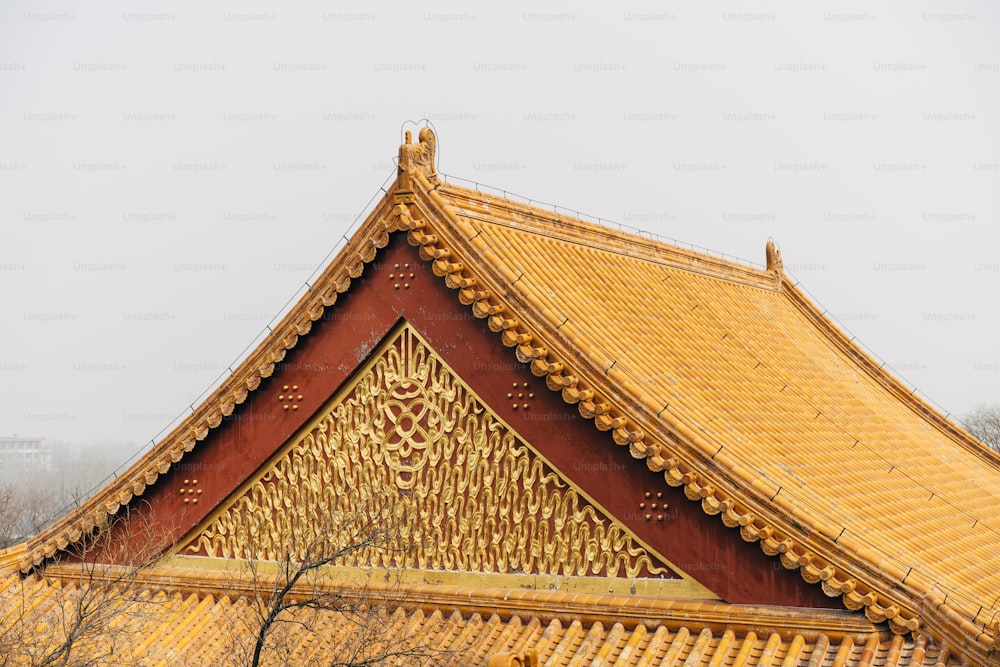 the roof of a building with a golden roof