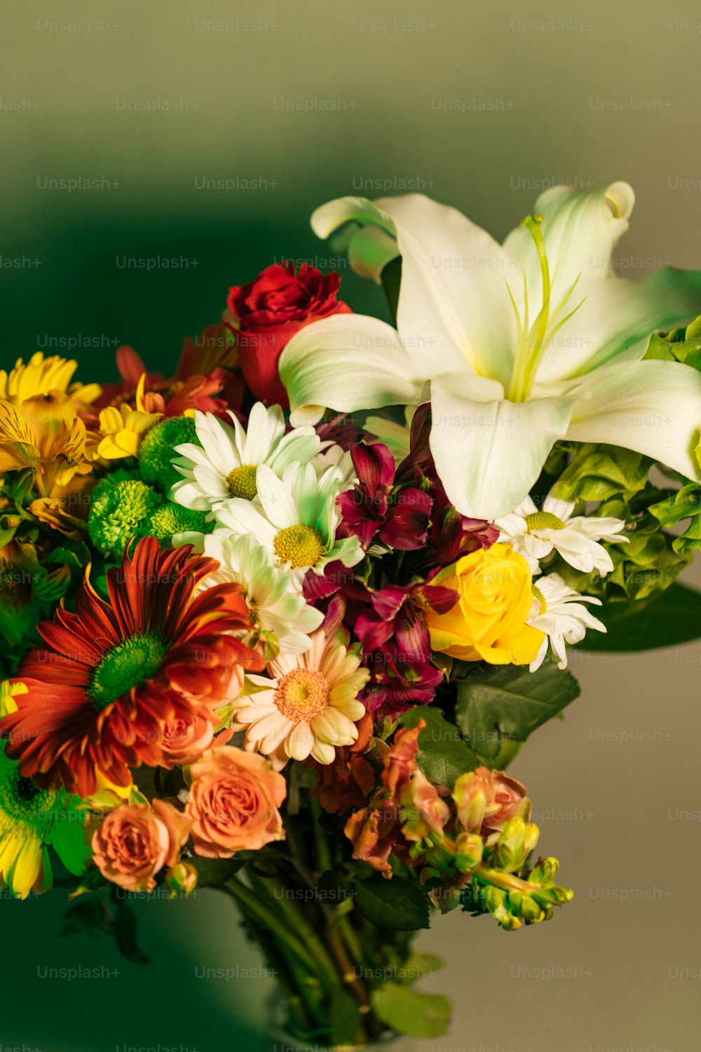 a bouquet of flowers in a vase on a table