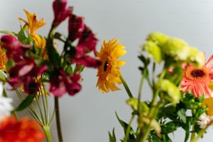 a bunch of flowers that are in a vase