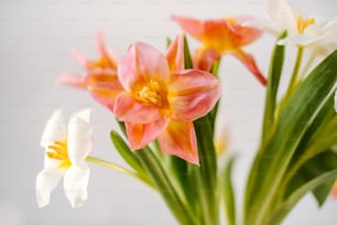 a bunch of flowers that are in a vase