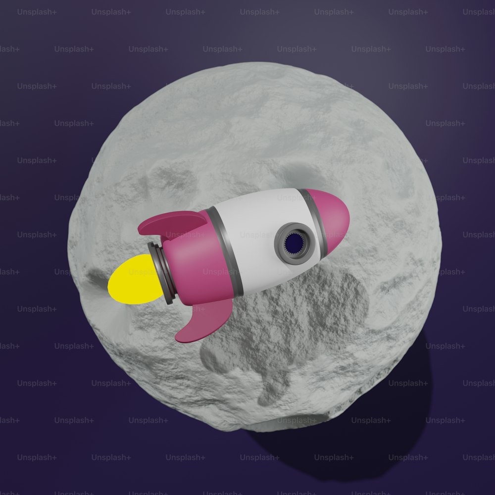 a pink and white rocket ship floating on top of a moon