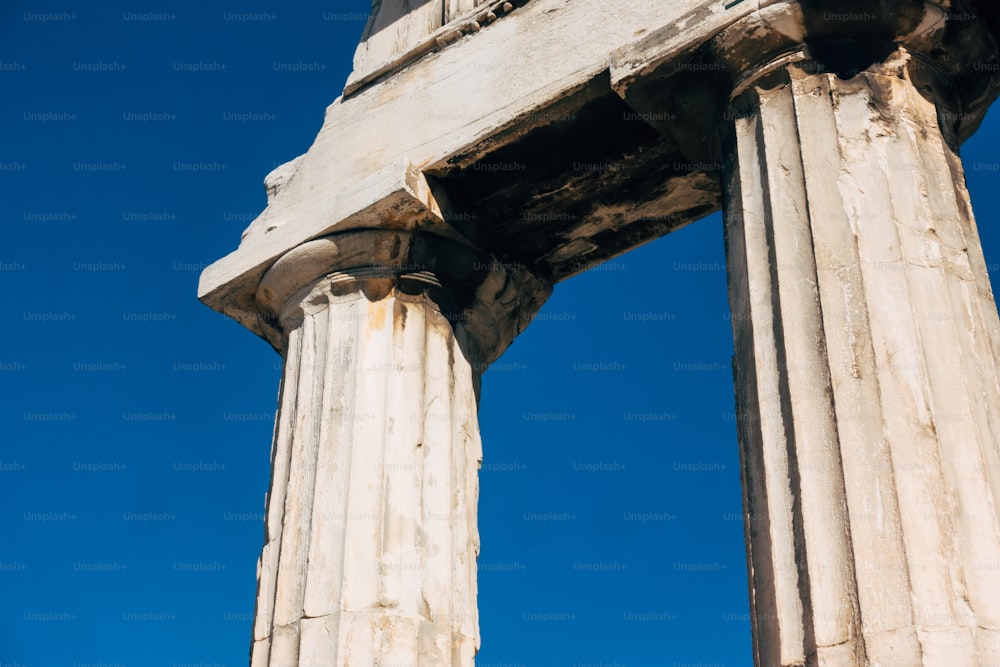 a close up of the top of two columns