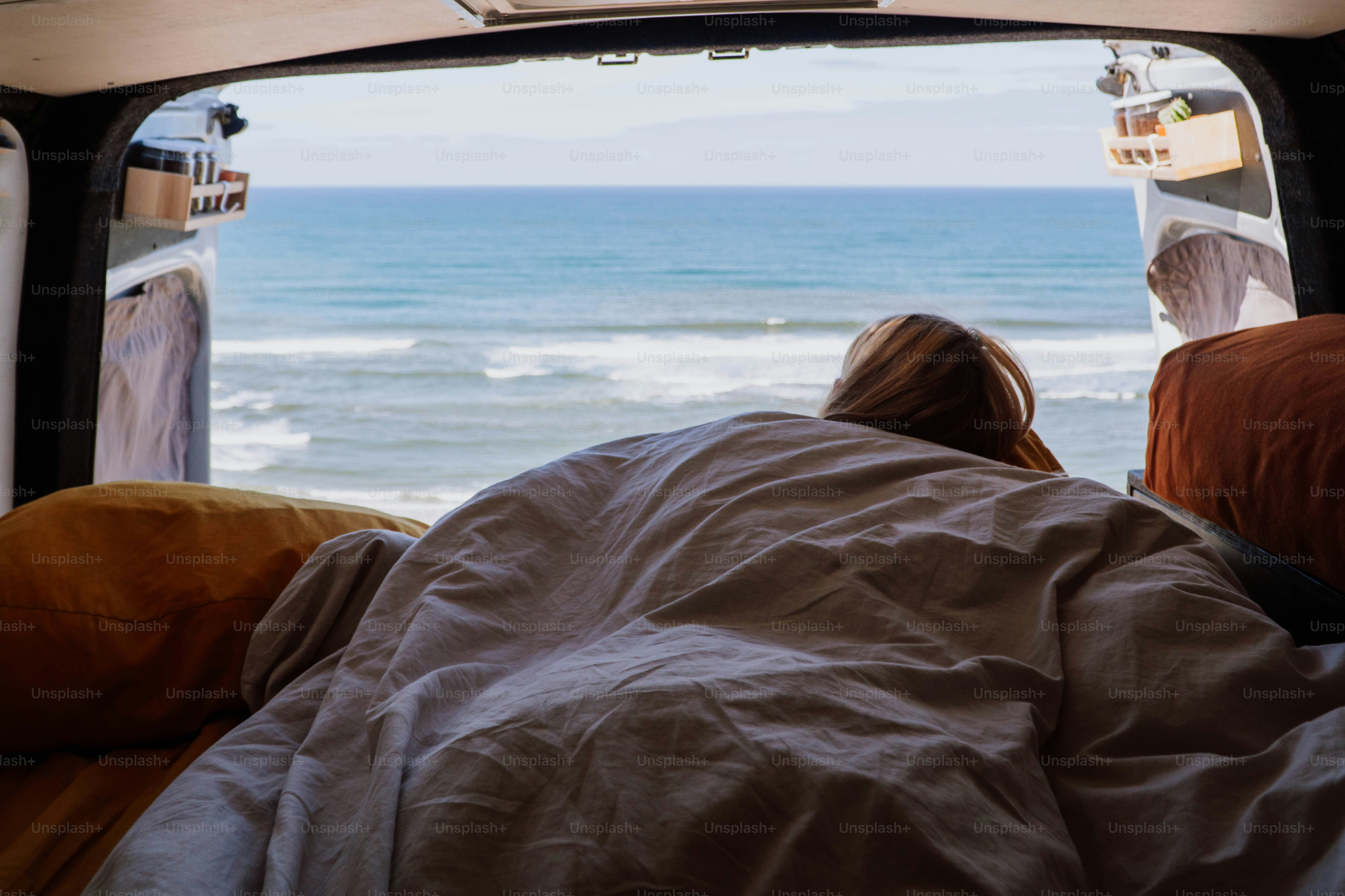 a couple of people that are sitting in a truck