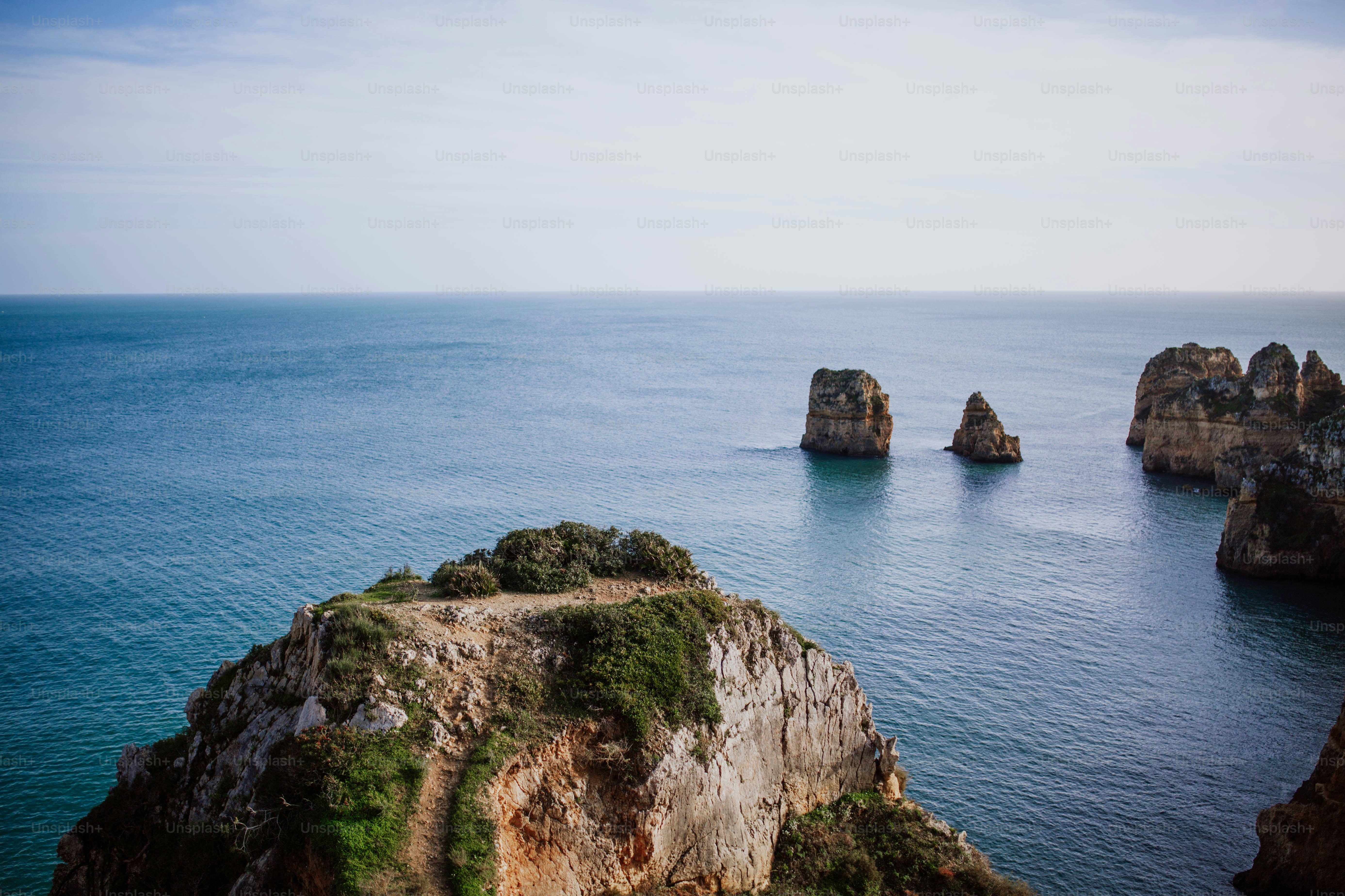 a large body of water surrounded by rocks