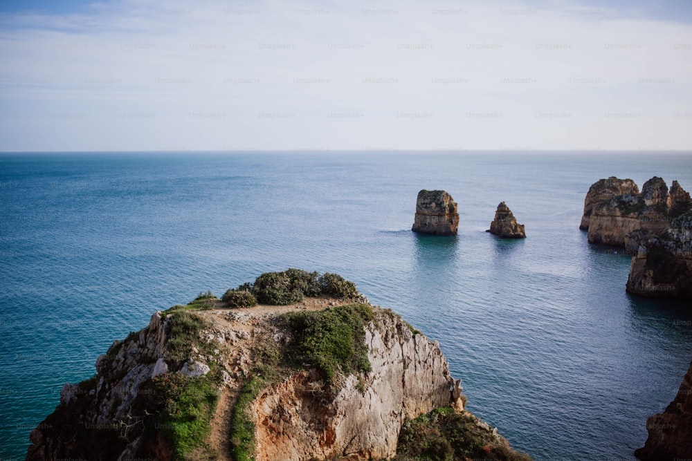 a large body of water surrounded by rocks