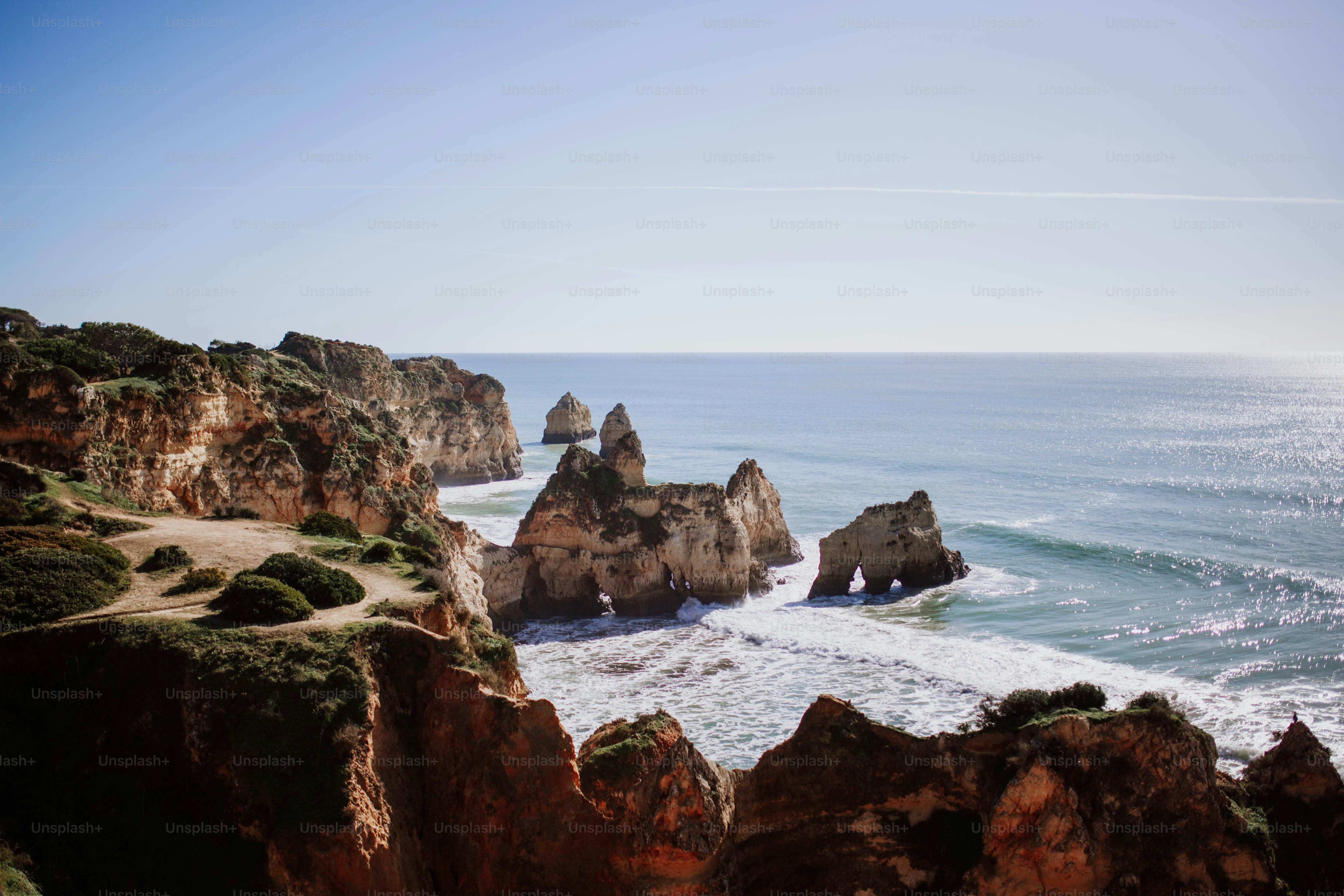 a view of the ocean from a cliff