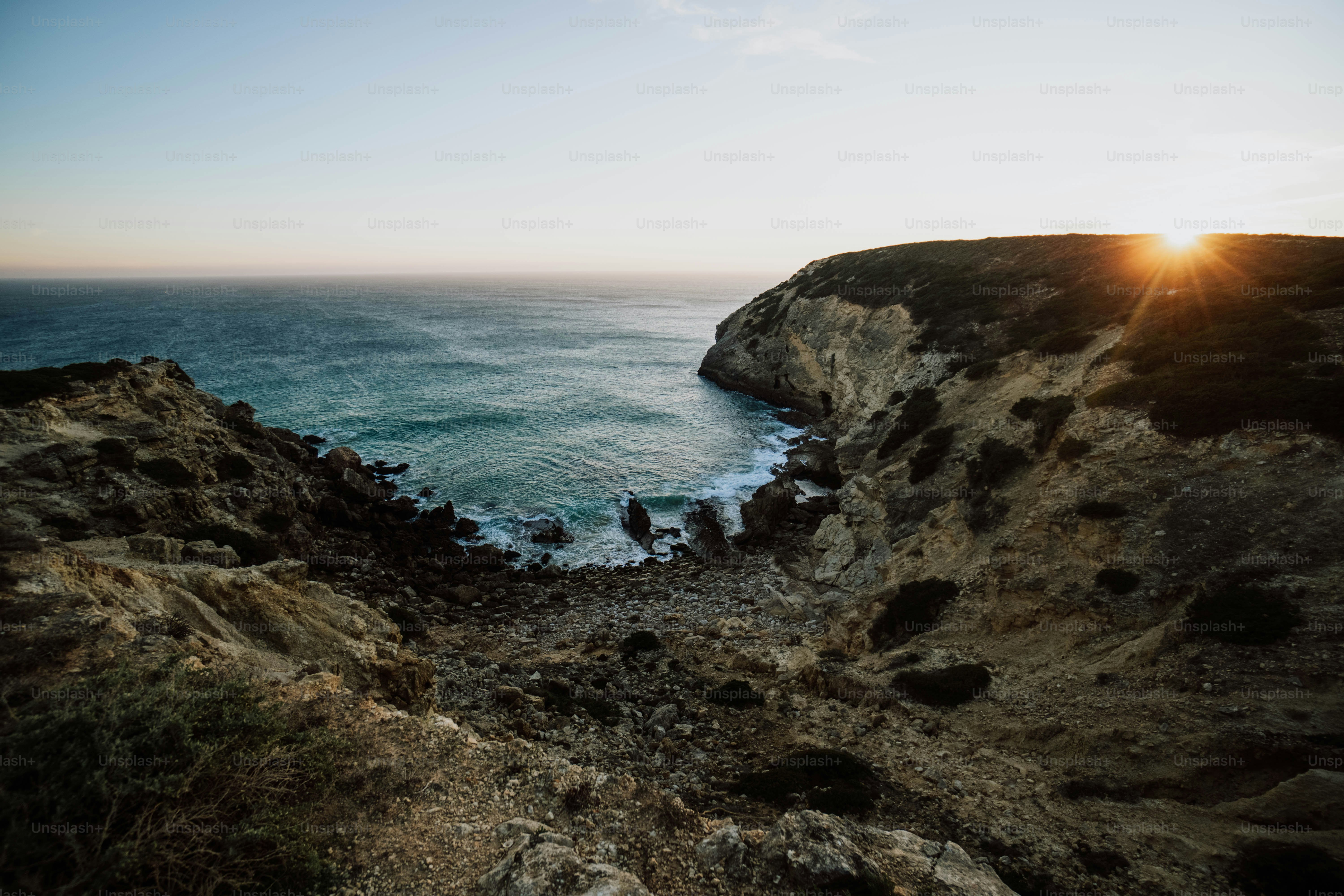 a view of the ocean from a cliff