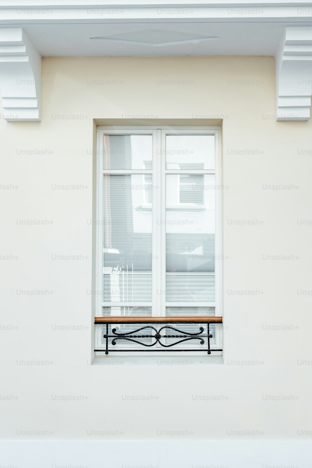 a window with a bench in front of it
