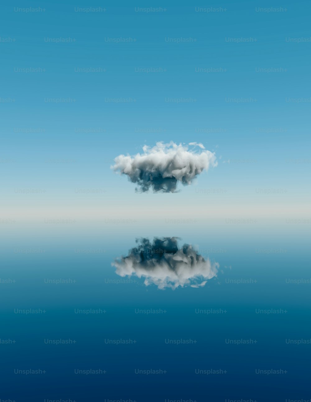 uma nuvem flutuando no céu sobre um corpo de água