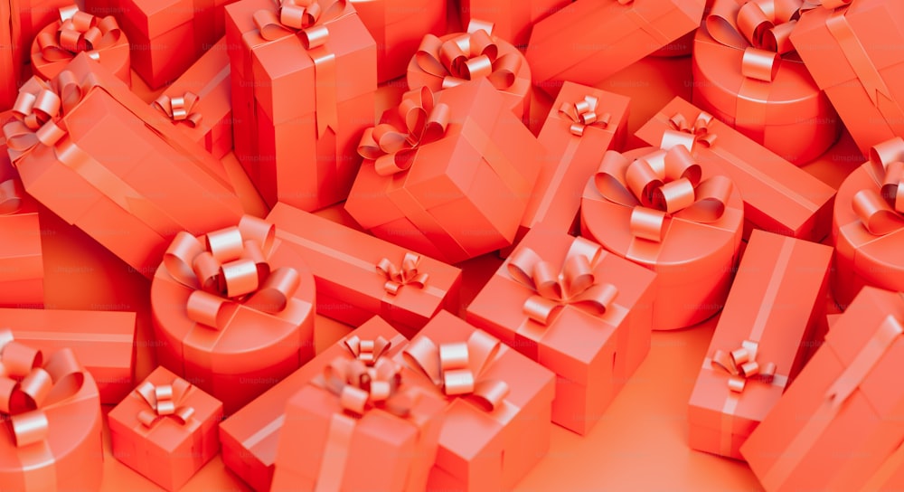 a pile of orange boxes with bows on them