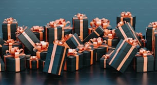 a pile of black and gold wrapped presents