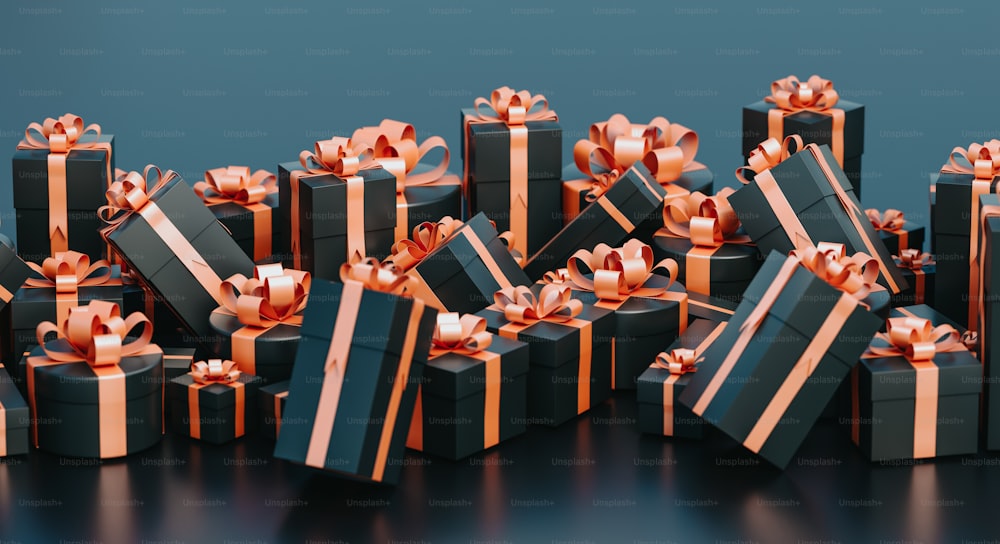 a pile of black and gold wrapped presents