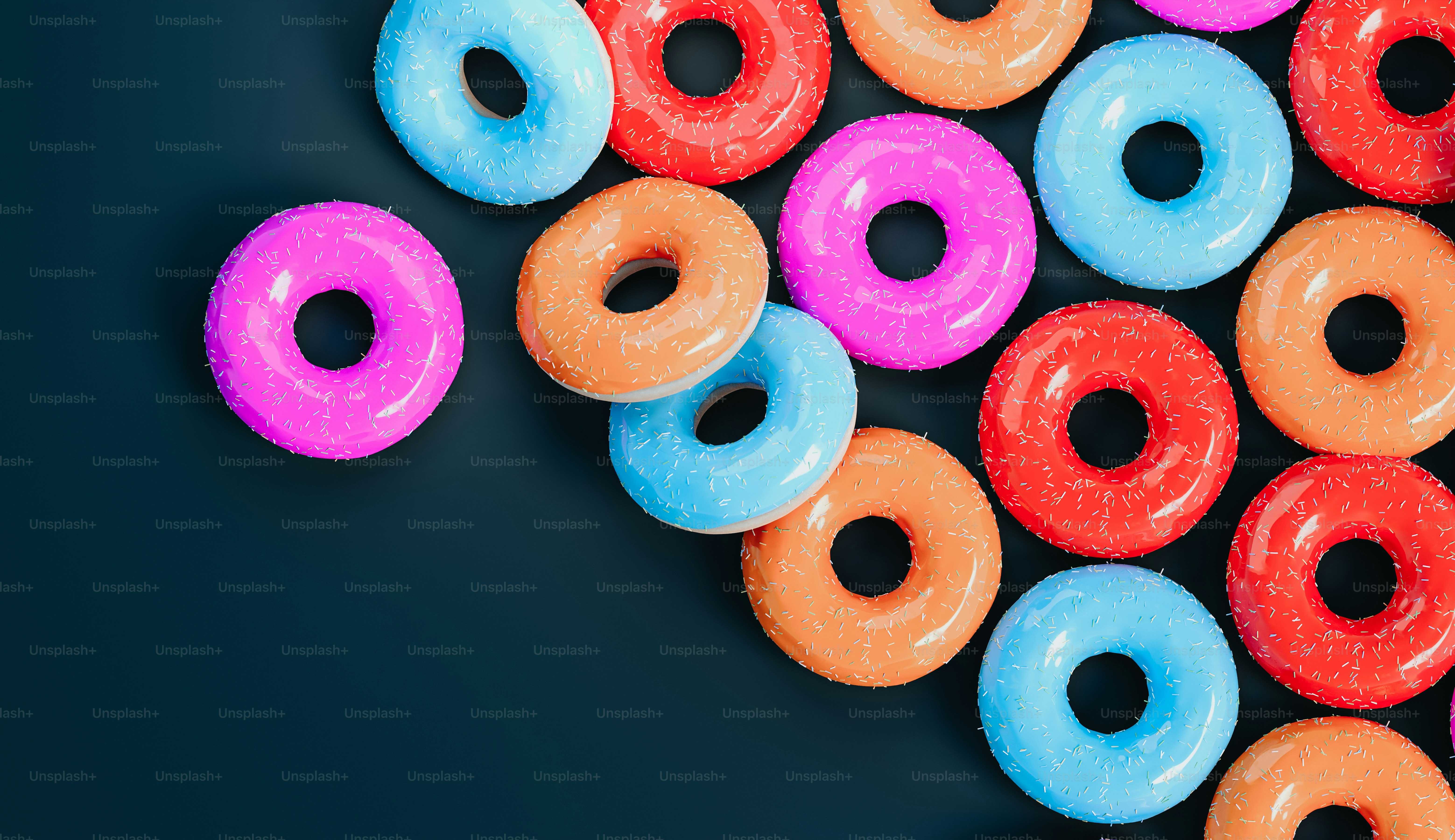 a group of colorful donuts sitting next to each other