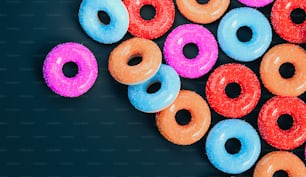 a group of colorful donuts sitting next to each other
