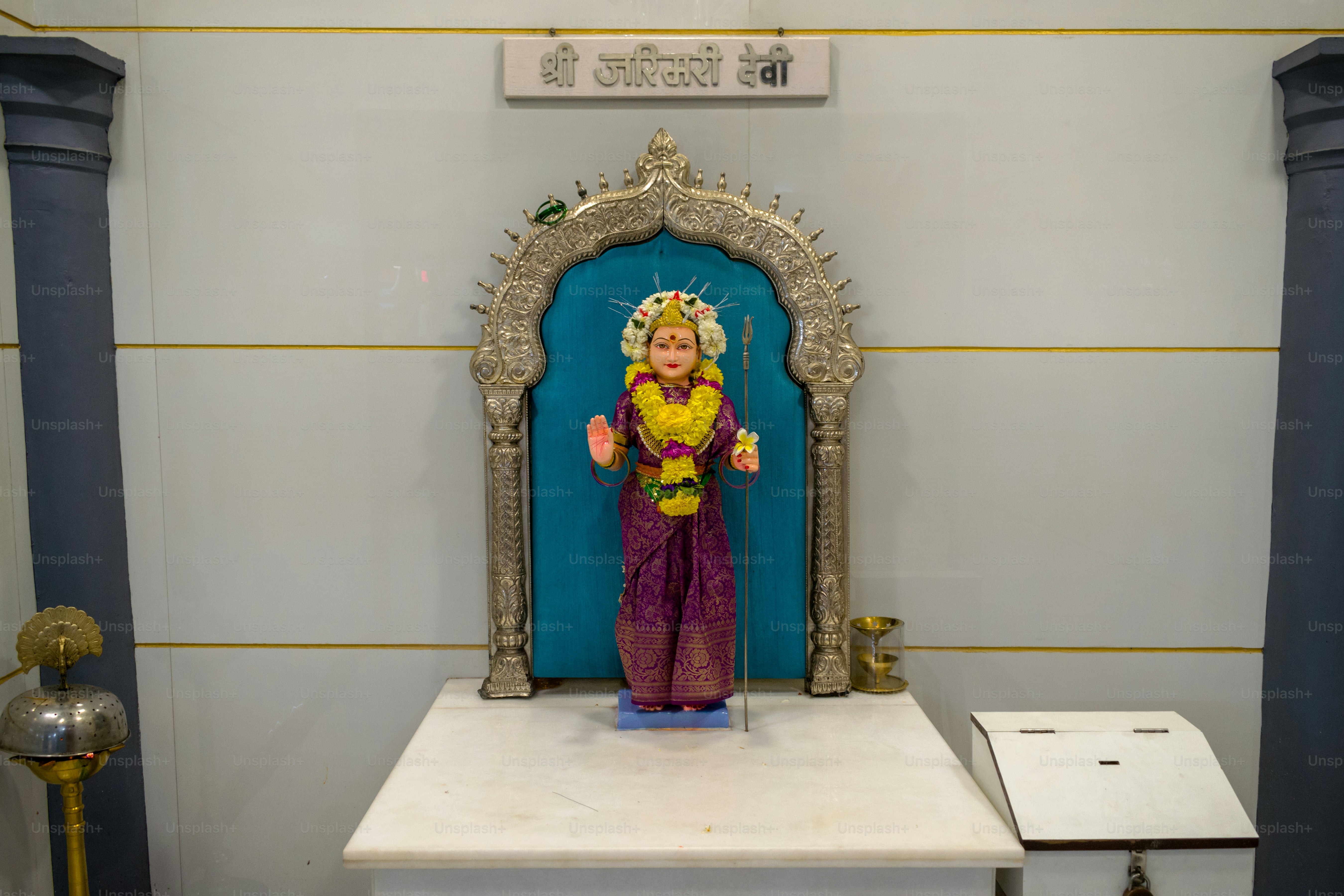 A beautiful idol of Maa Jarimari Devi being worshipped at a Hindu temple in Mumbai, India for the festival of Navratri or Durga Puja