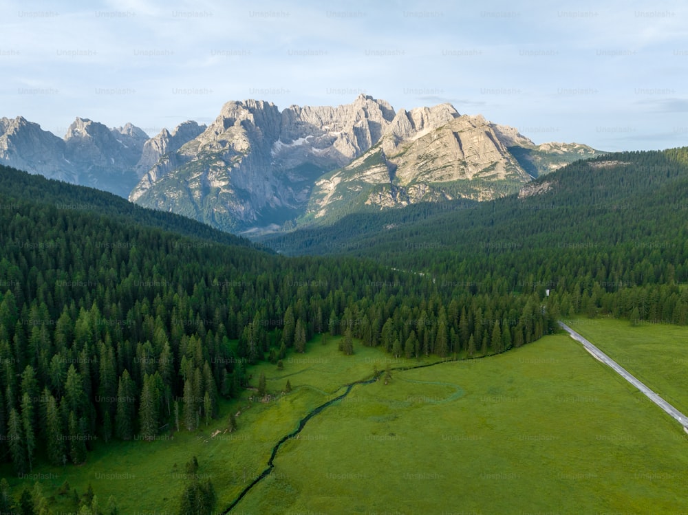 an aerial view of a mountain range with a river running through it