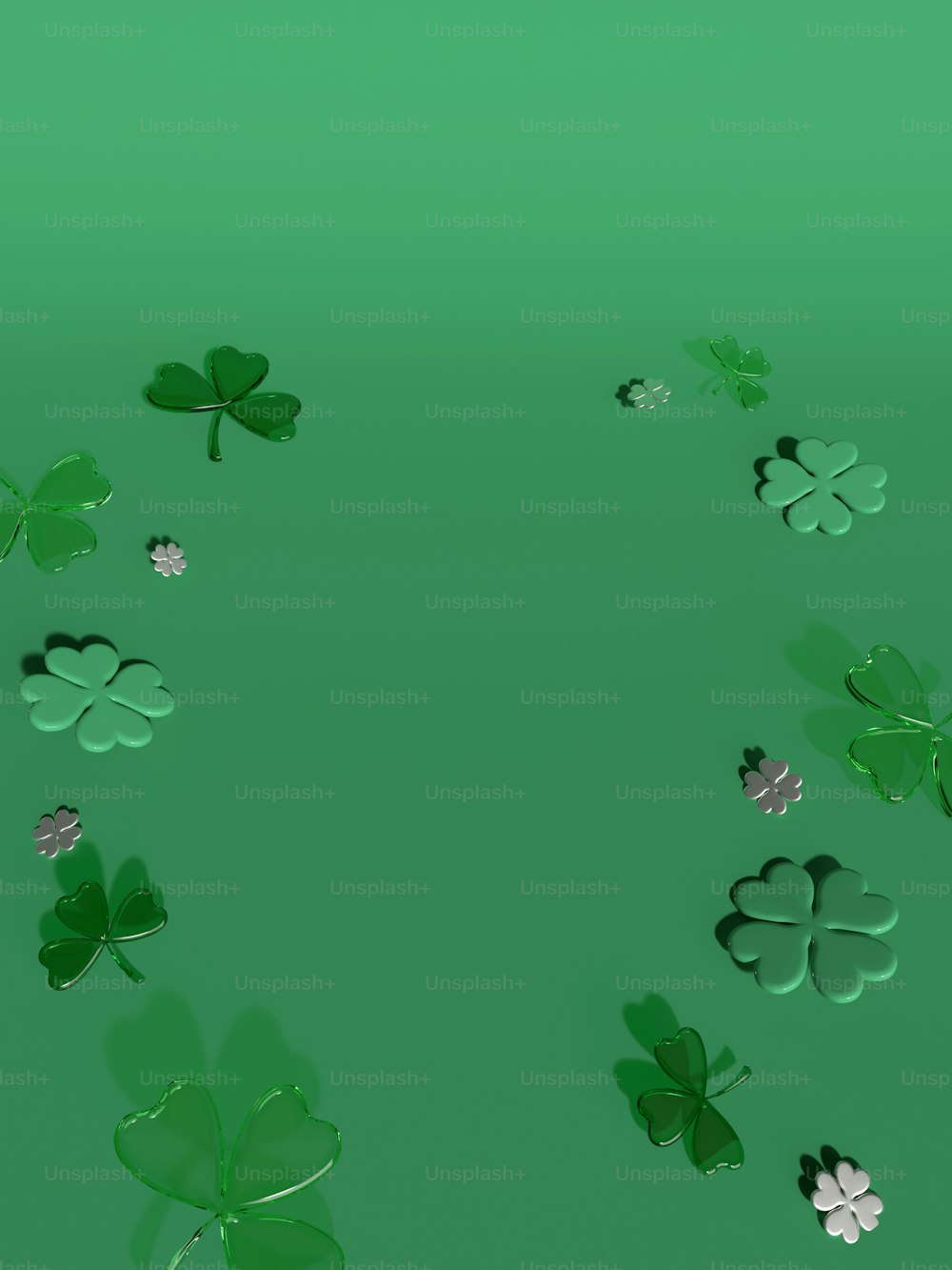 a group of green shamrocks on a green background