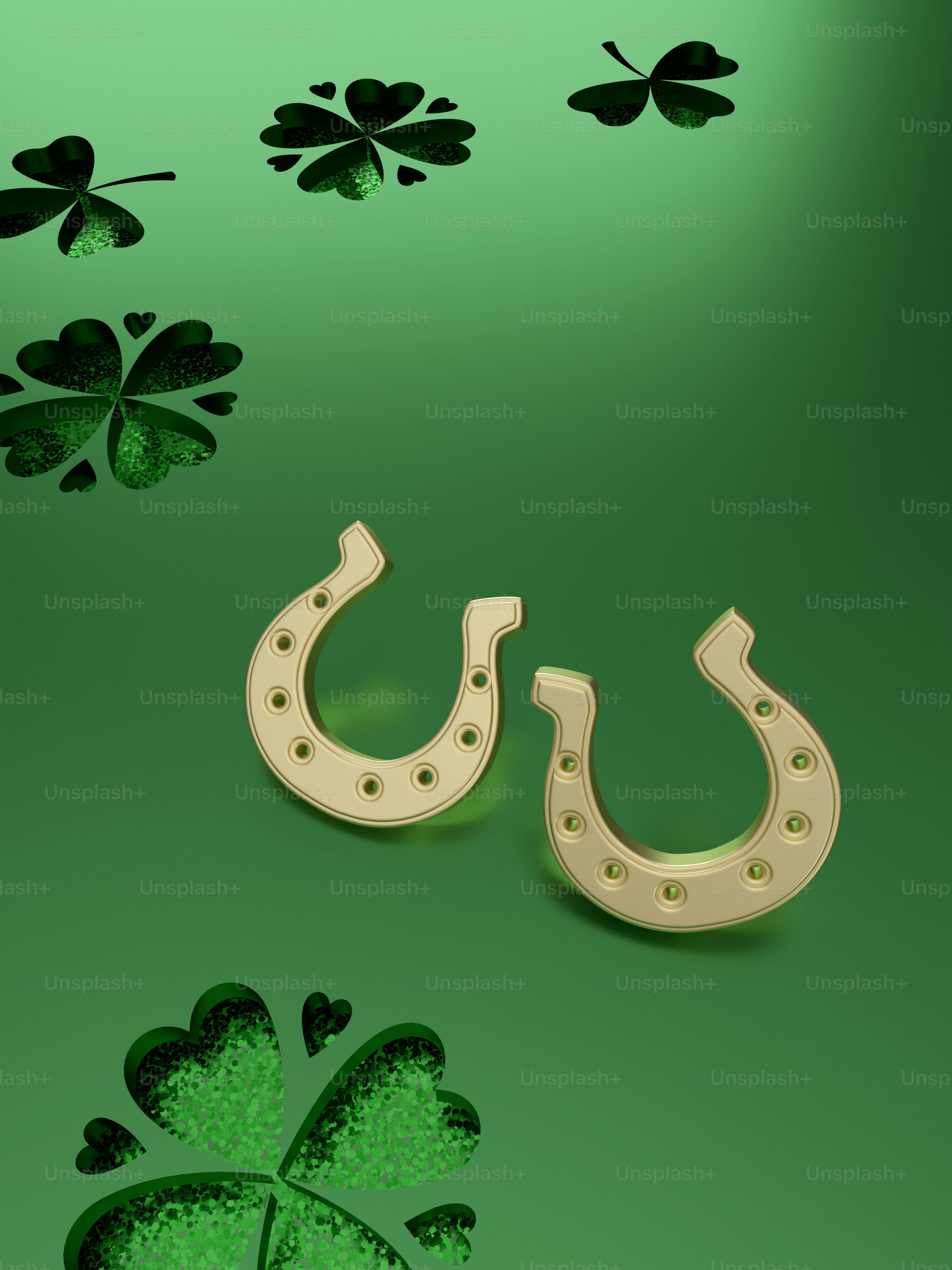 A pair of horseshoes sitting on top of a green background photo