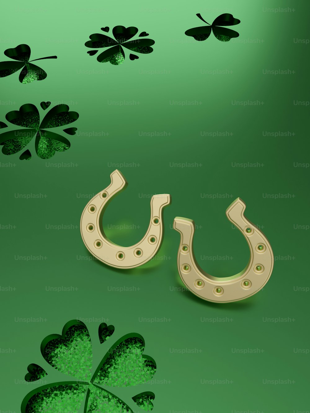 a pair of horseshoes sitting on top of a green background